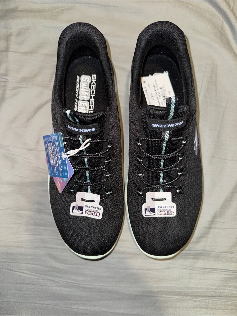 Skechers Women's Black Knit Slip-On Sneakers with Mint Accent